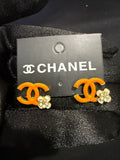 Orange “CC” Spring Earrings