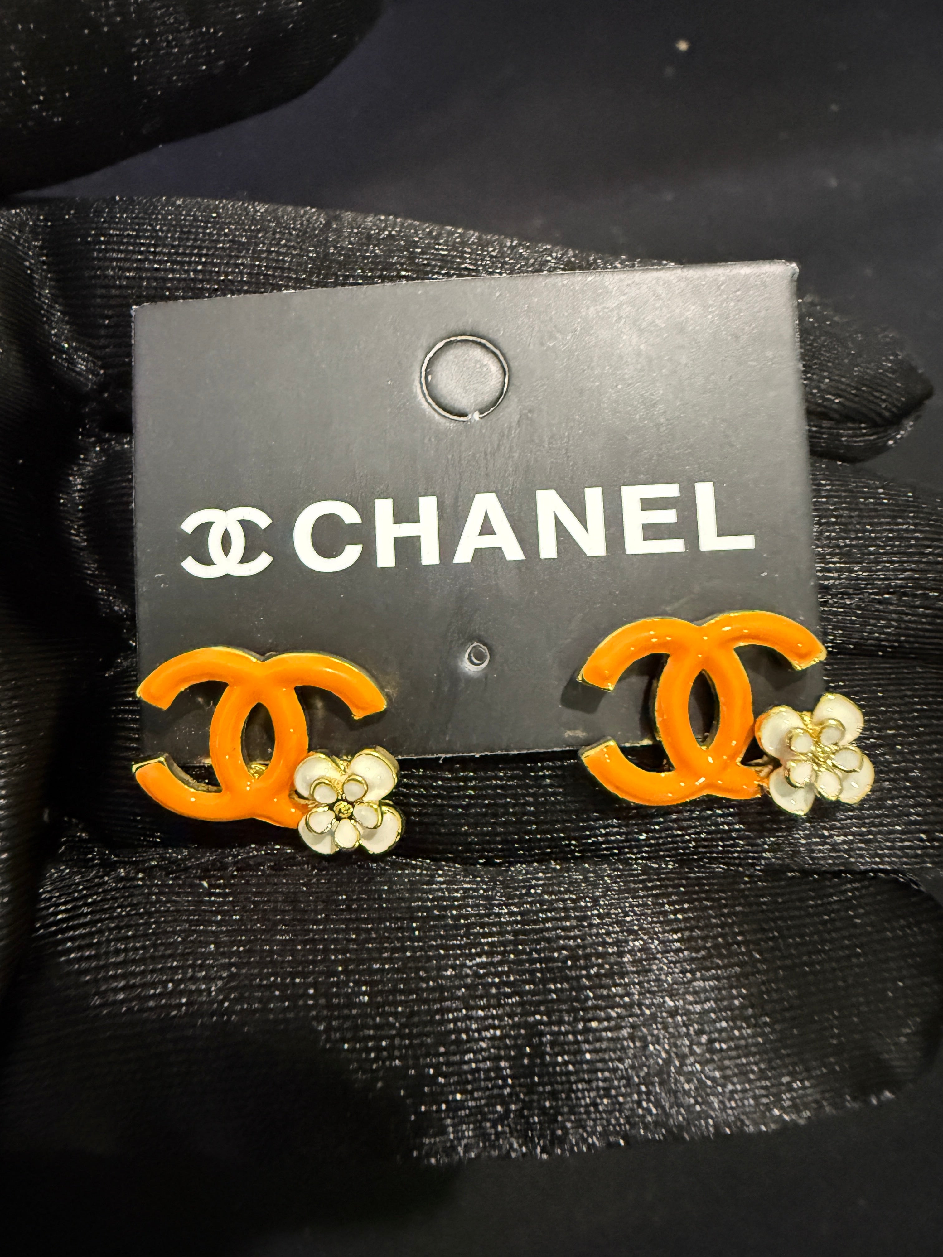 Orange “CC” Spring Earrings