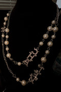 Pearl Charm “CC” Necklace