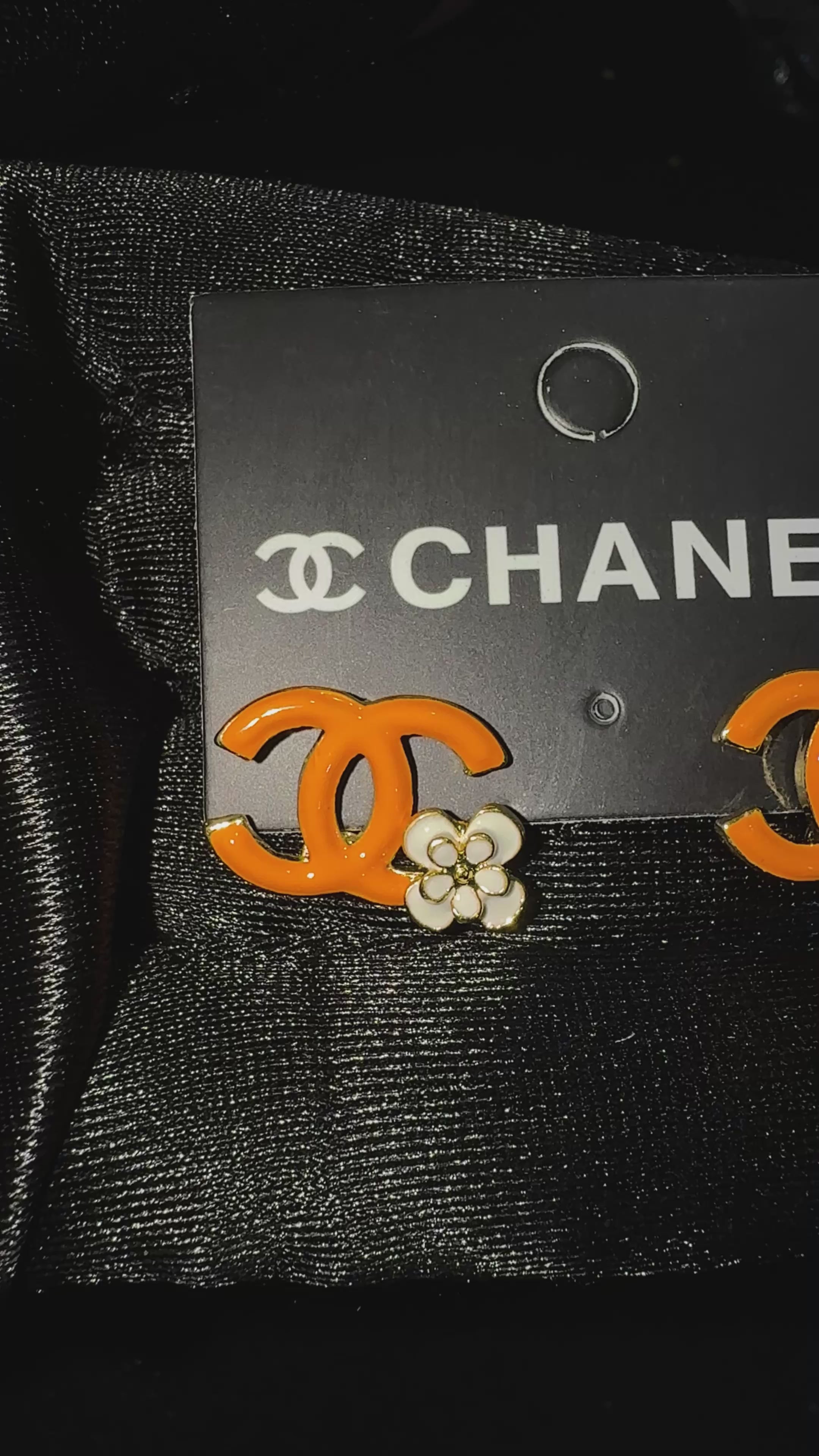 Orange “CC” Spring Earrings